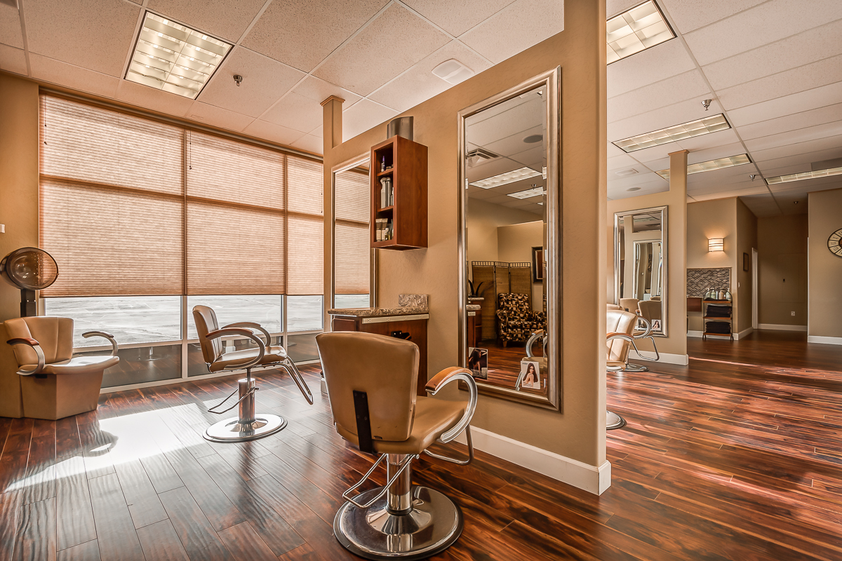 Styling chairs and mirrors beside the windows at Avalon in Klamath Falls
